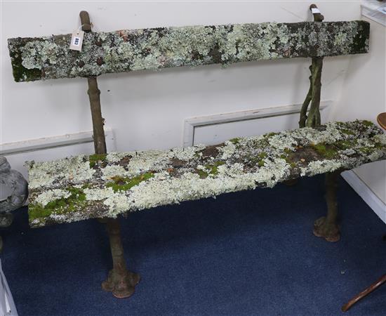 A wrought iron bench W.145cm